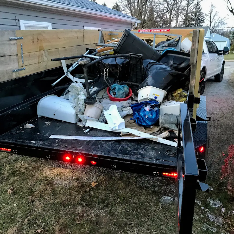 Roll-off dumpster delivered to a residential driveway in Monrovia
